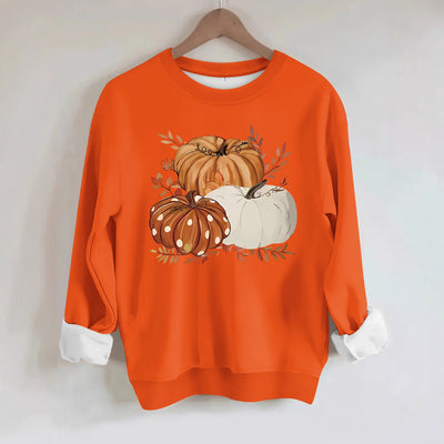 Three pumpkin patterned printed hoodies